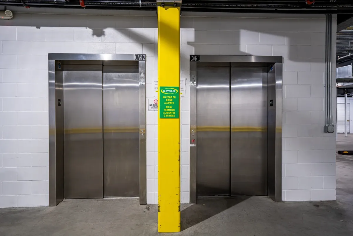Interior of self storage facility, view of elevator.
