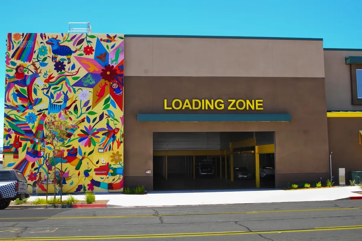 Exterior view of U-Stor-It self storage facility, view of loading zone.